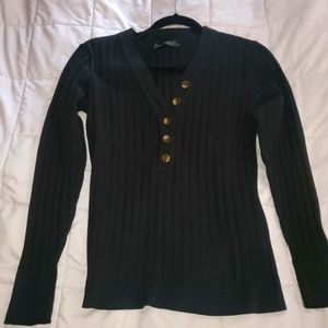 Black v-neck sweater